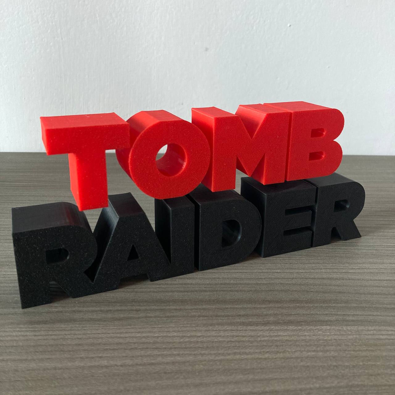 3D fan art of the TOMB RAIDER Lara Croft logo for gaming desktop